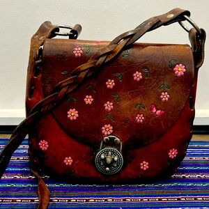 Vintage 1970’s hand painted, hand tooled saddlebag purse.